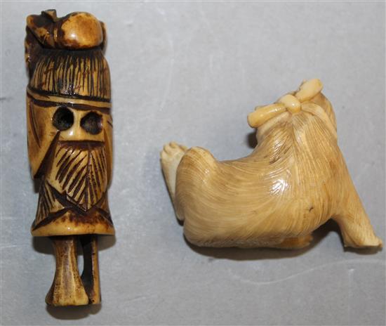 A Japanese ivory figure of a cat and a stag horn netsuke, 5.8cm